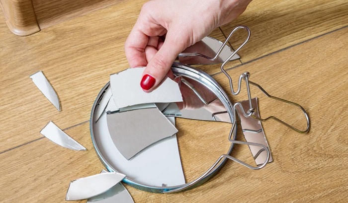 how to fix a broken mirror