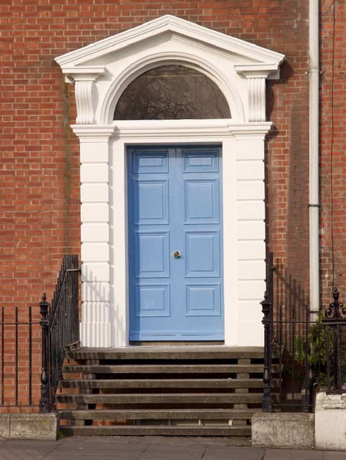 blue-front-door-brick-house
