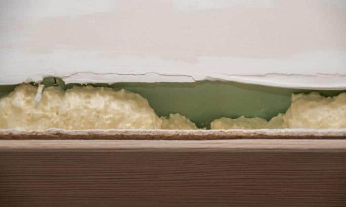 covering-crevices-in-the-stair-with-expanding-foam