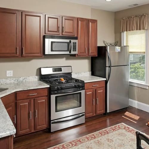 hazelnut-wood-floors-with-cherry-cabinets