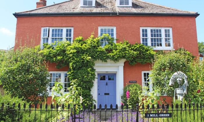 periwinkle-colors-go-with-orange-brick-house