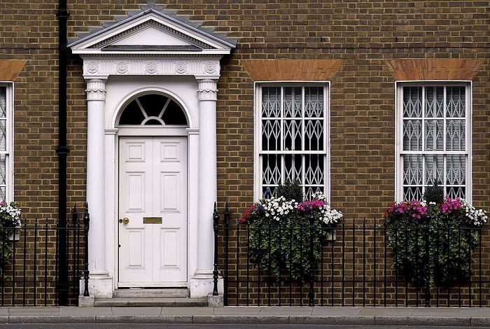 white-front-door-brick-house