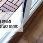 how to clean between sliding glass doors