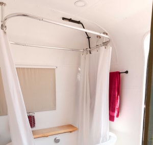 install-curved-shower-curtain-rod