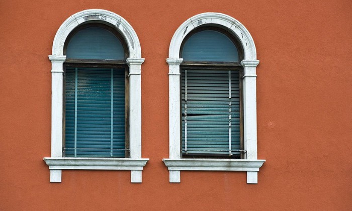 Install-shutters-to-Modernize-Arched-Windows