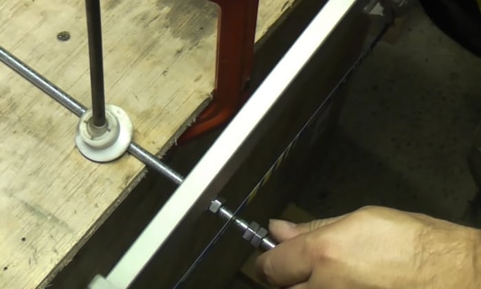 Use-of-hacksaw-to-cut-a-threaded-rod