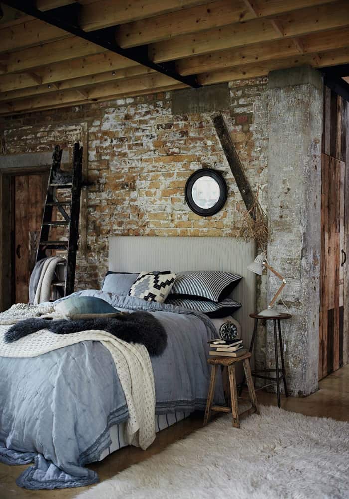 brick-walls-and-wood-beams-exposed-attic-room