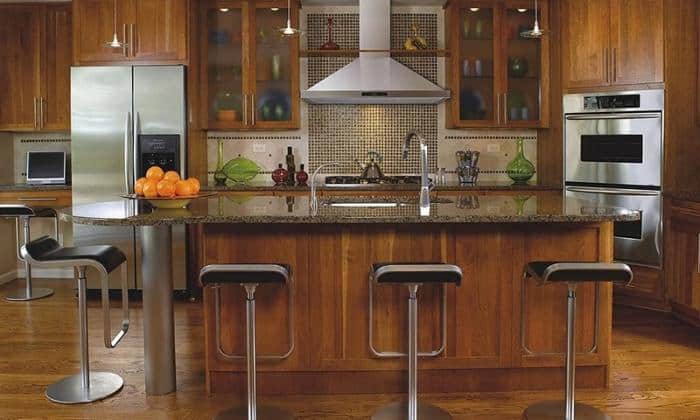 wood-grain-cabinets-with-black-granite-countertops