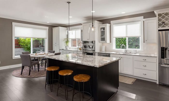 santa-cecilia-granite-with-black-kitchen-cabinets