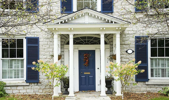 blue-shutters-for-cream-house