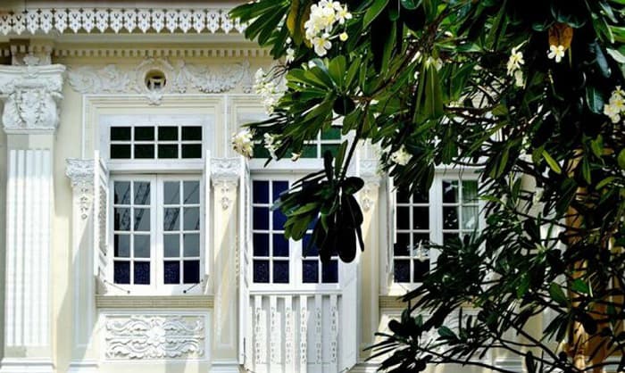white-shutters-for-cream-house